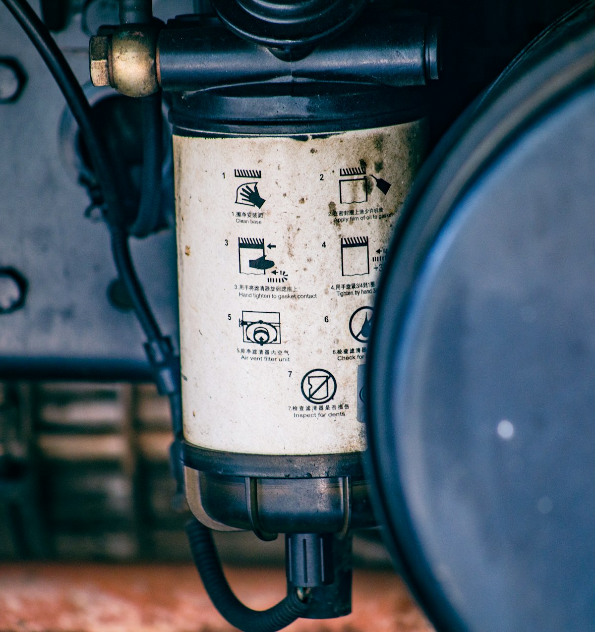 Close-up of a fuel filter during engine diagnostics