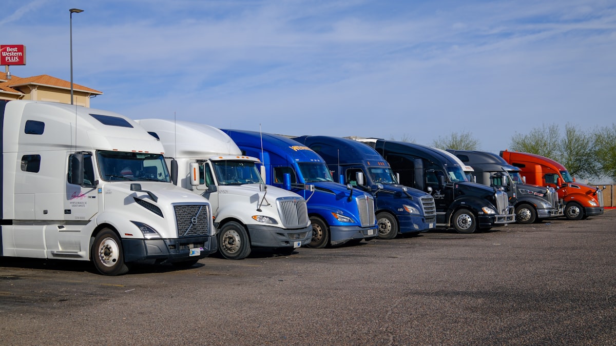 Row of fleet trucks lined up for maintenance