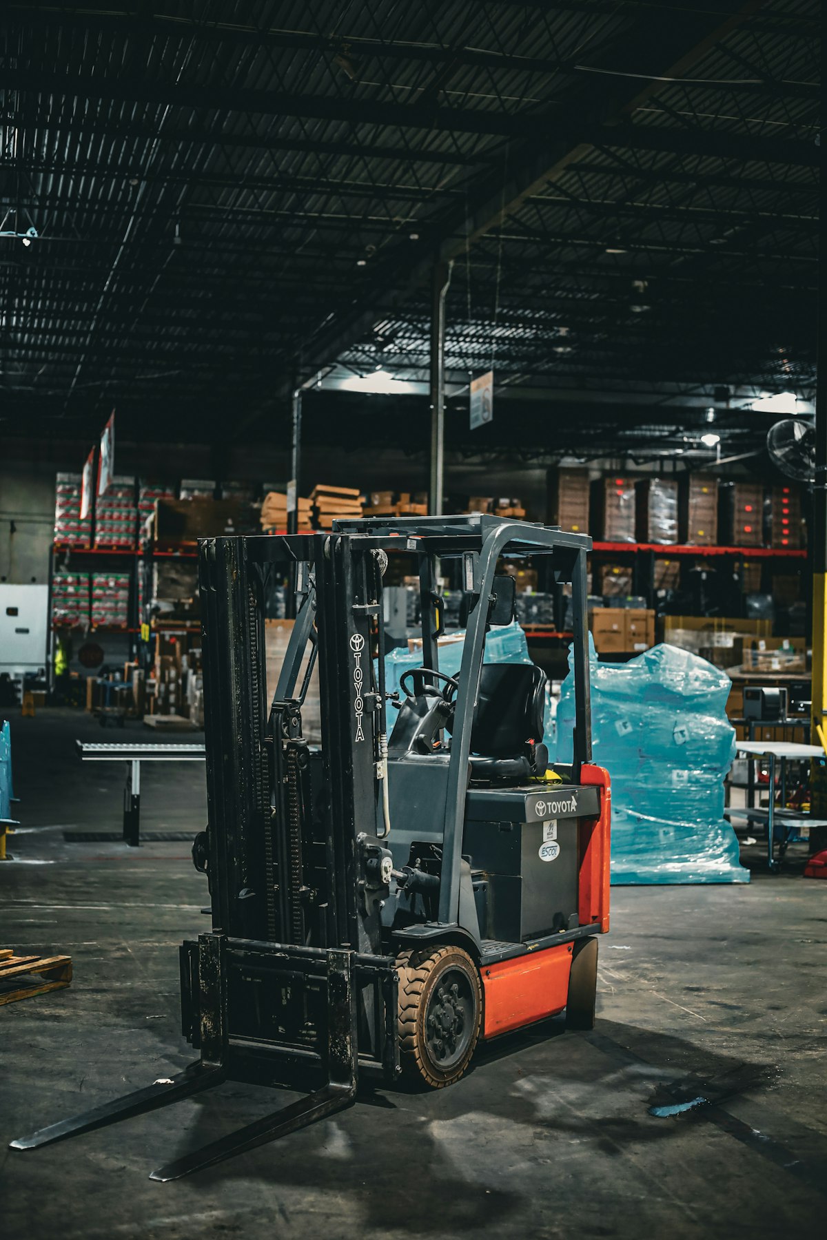 Forklift in a warehouse ready for repair
